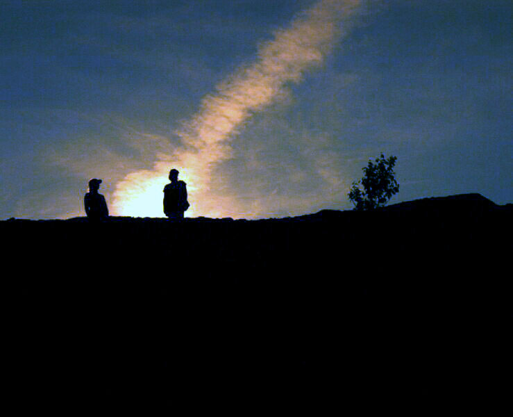 Girls Climbing Boney Pile at Sunset